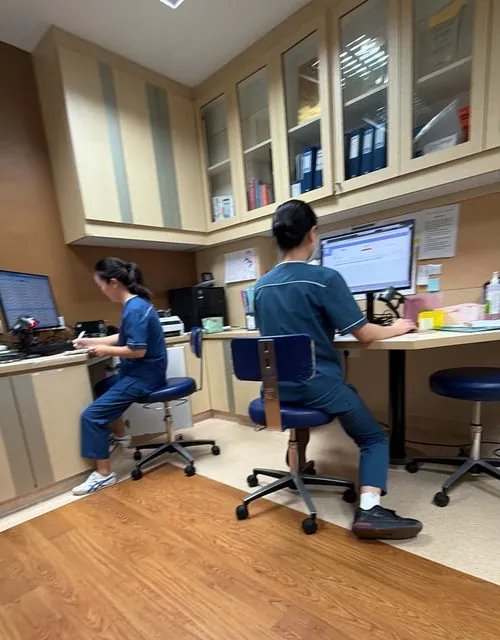 Clinic staff at their workstations